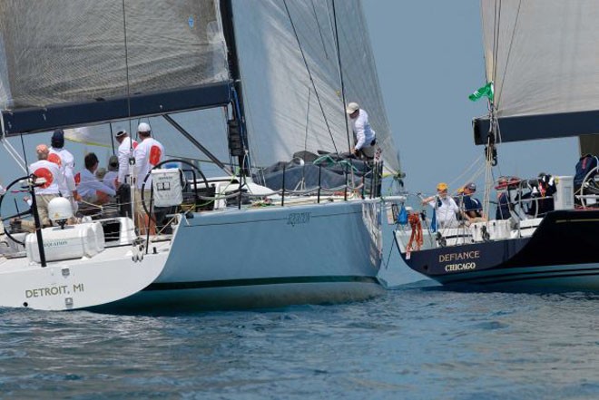 Words are exchanged as Equation of Bayview Yacht Club, left, is cut off by Defiance of Chicago Yacht Club on Saturday, July 14, 2012, at the starting line for the PHRF A Class - Bayview Mackinac Race 2012 © The Times Herald, Mark R. Rummel / AP